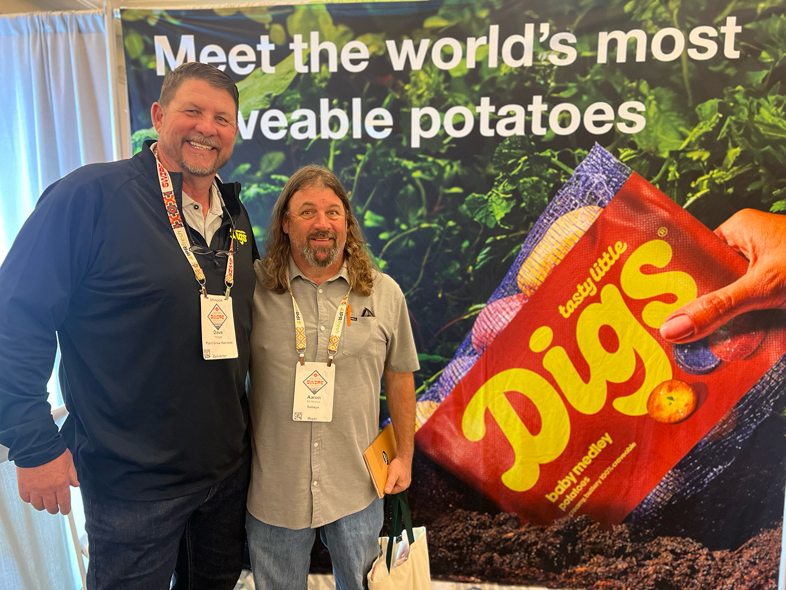 Aaron McNeese (right) of Sobey’s stopped to visit with Dave Yeager of Plant Grow Harvest.