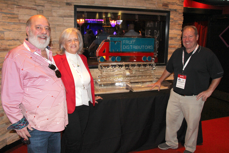 Mark and Maria DeFrancesco of 4M Fruit Distributors, a sponsor of the NEPC opening reception, with Tom Murray of Roche Bros.