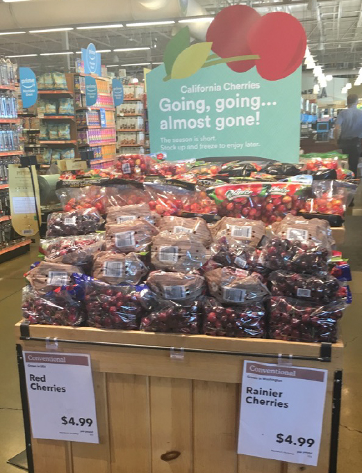 a display of red cherries