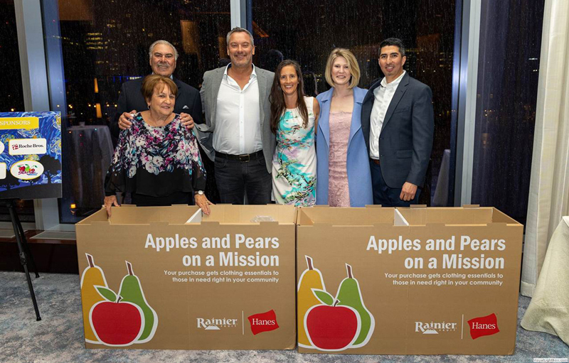 Representatives from Rainer, which sponsored the donation and provided the collection boxes.